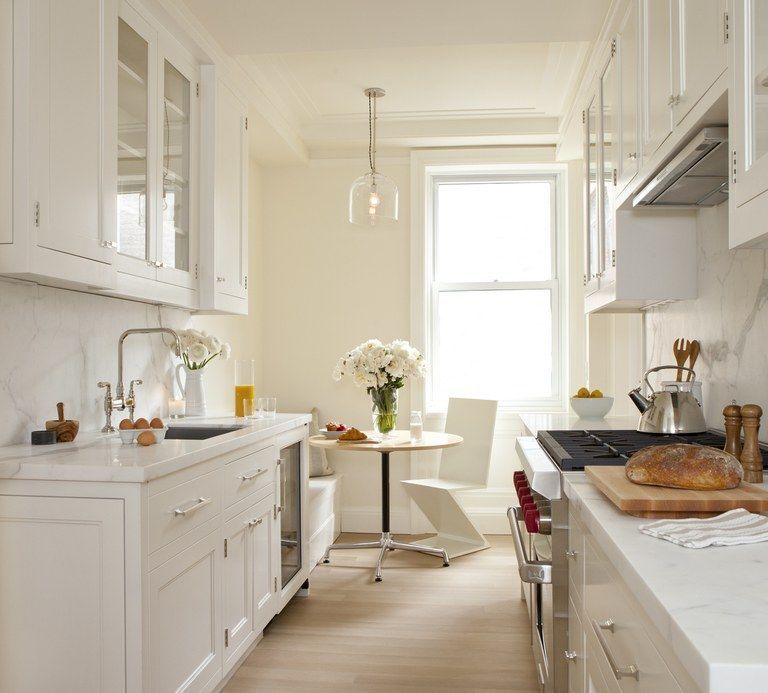 Kitchen cabinets that go all the way to the ceiling appear to "raise" the ceiling height.