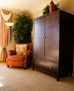 A large piece of furniture, like this armoire, can function as a focal point.