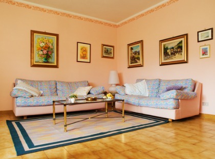 Living room with a dated wallpaper border.