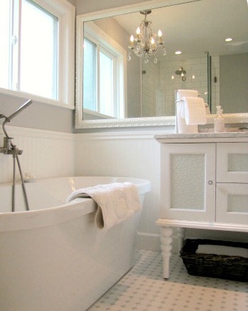 Master bath with large mirror.