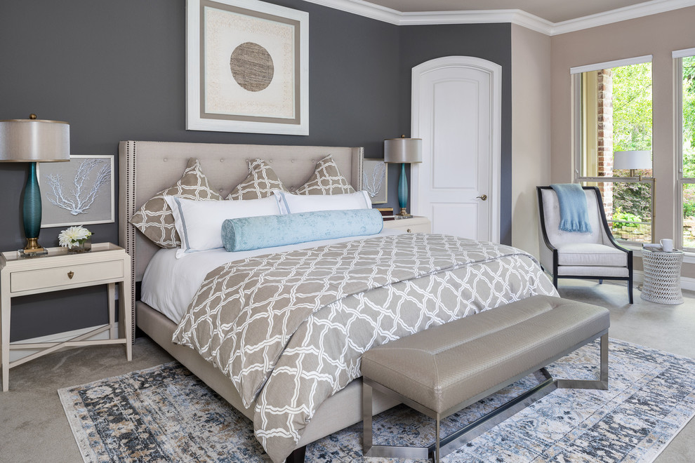 Monochromatic master bedroom with blue accents.