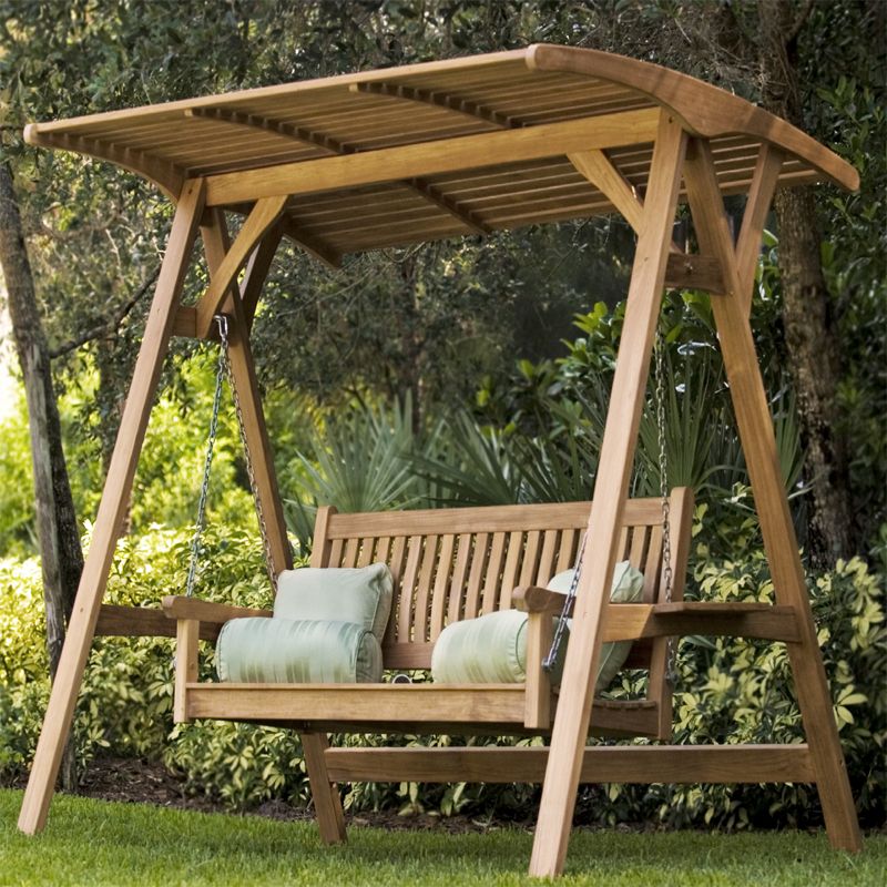 An outdoor covered swing will shelter from the sun and rain.