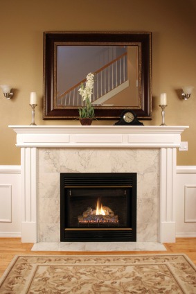 Pictures or mirrors above a fireplace should be about 2/3 the width of the fireplace for best proportion.