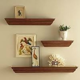 Display decorative objects off center on shelves for a more casual look.