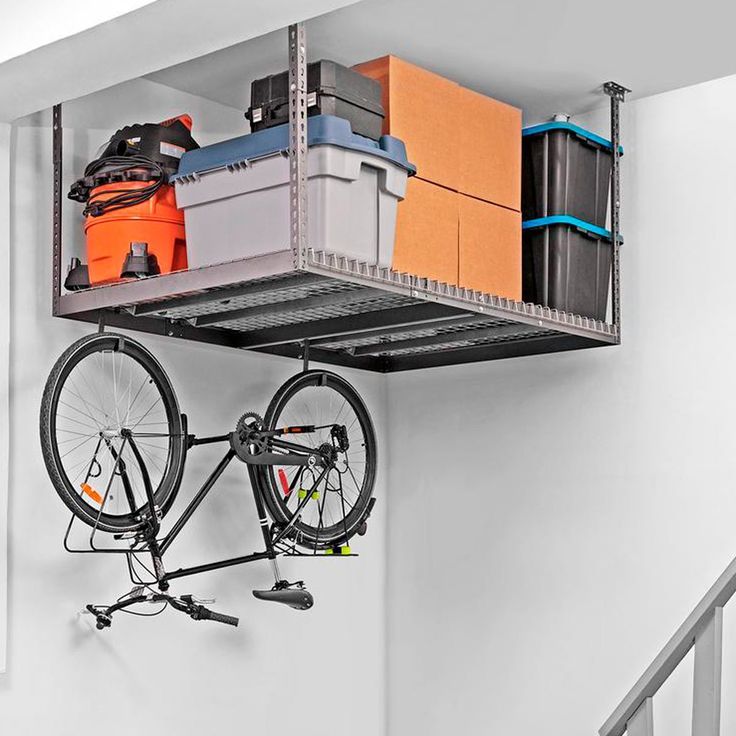 Take advantage of high garage ceilings by installing overhead storage racks.