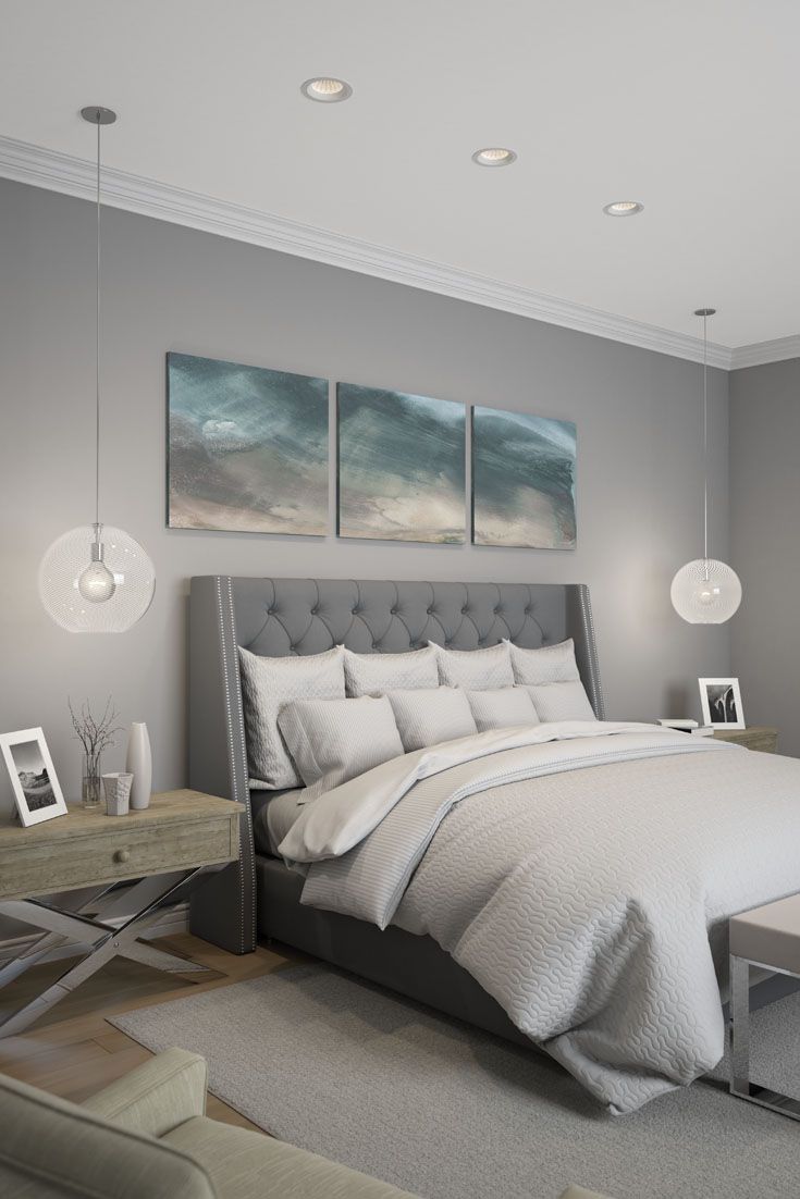 Recessed lighting and clear pendants take up very little "visual space" in this bedroom.