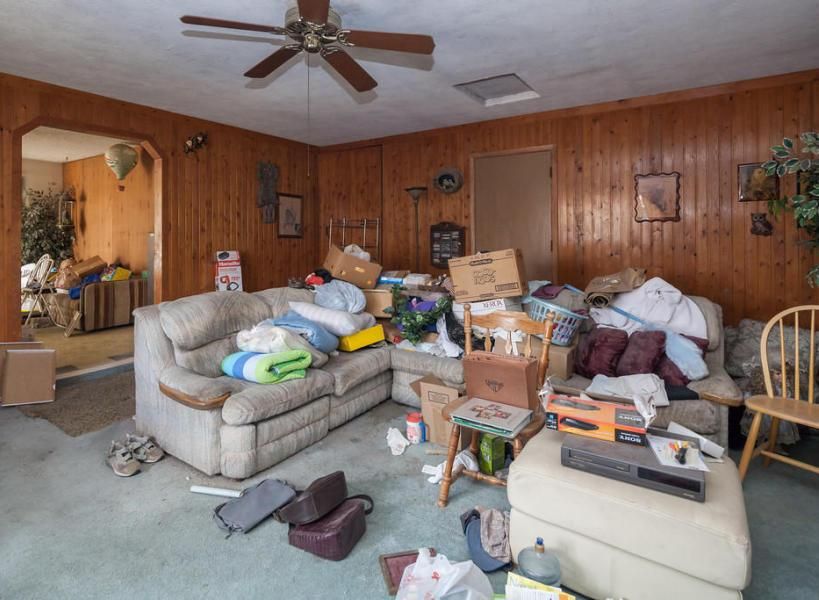 A cluttered living room.