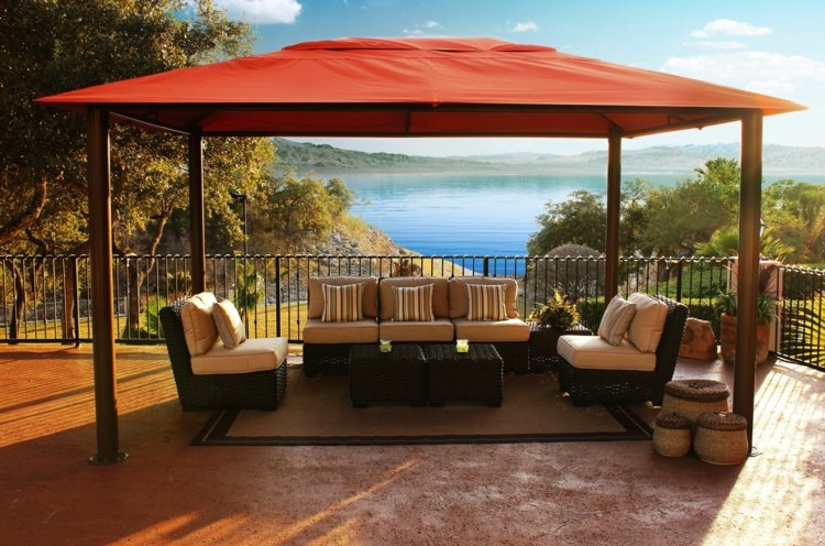 A pergola with canvas roof will shield from sun and rain.
