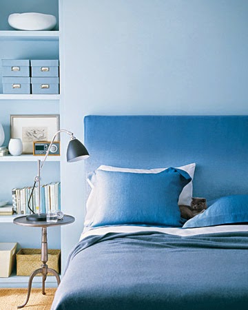 Monochromatic bedroom in blue hues.