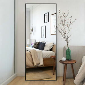 A large floor mirror will "visually" enlarge a small space.