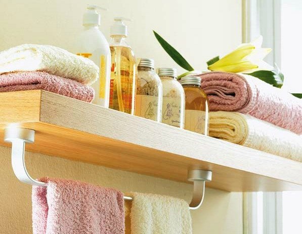 A floating shelf in the bathroom.