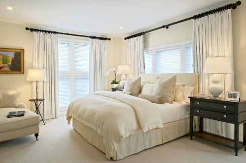 Light flooring, walls, ceiling and bedding "visually" expand this small monotone style bedroom.