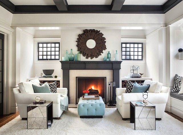 Symmetrical living room with a fireplace.