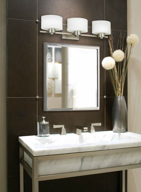 Bathroom sink with matching satin-nickel fixtures.