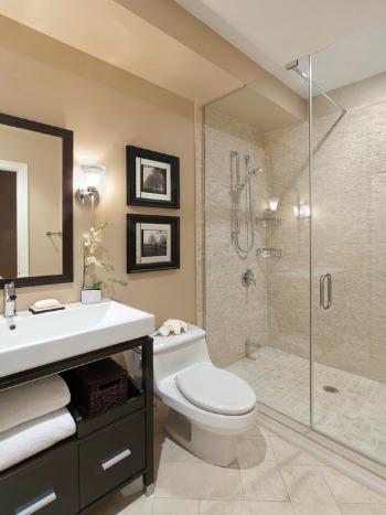 Updated bathroom with glass shower doors.