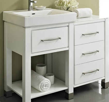 White bathroom vanity with open cabinetry.