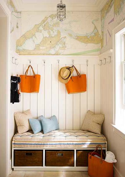 Small, but charming foyer with storage and seating.