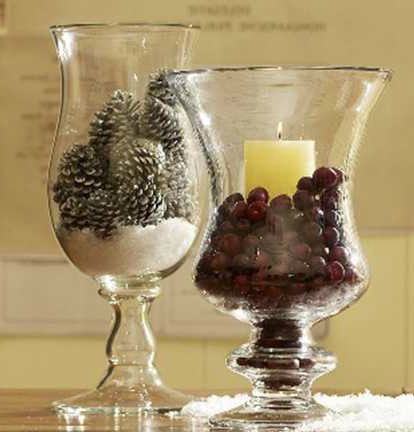 Fill glass canisters with pretty objects from nature, like pinecones.