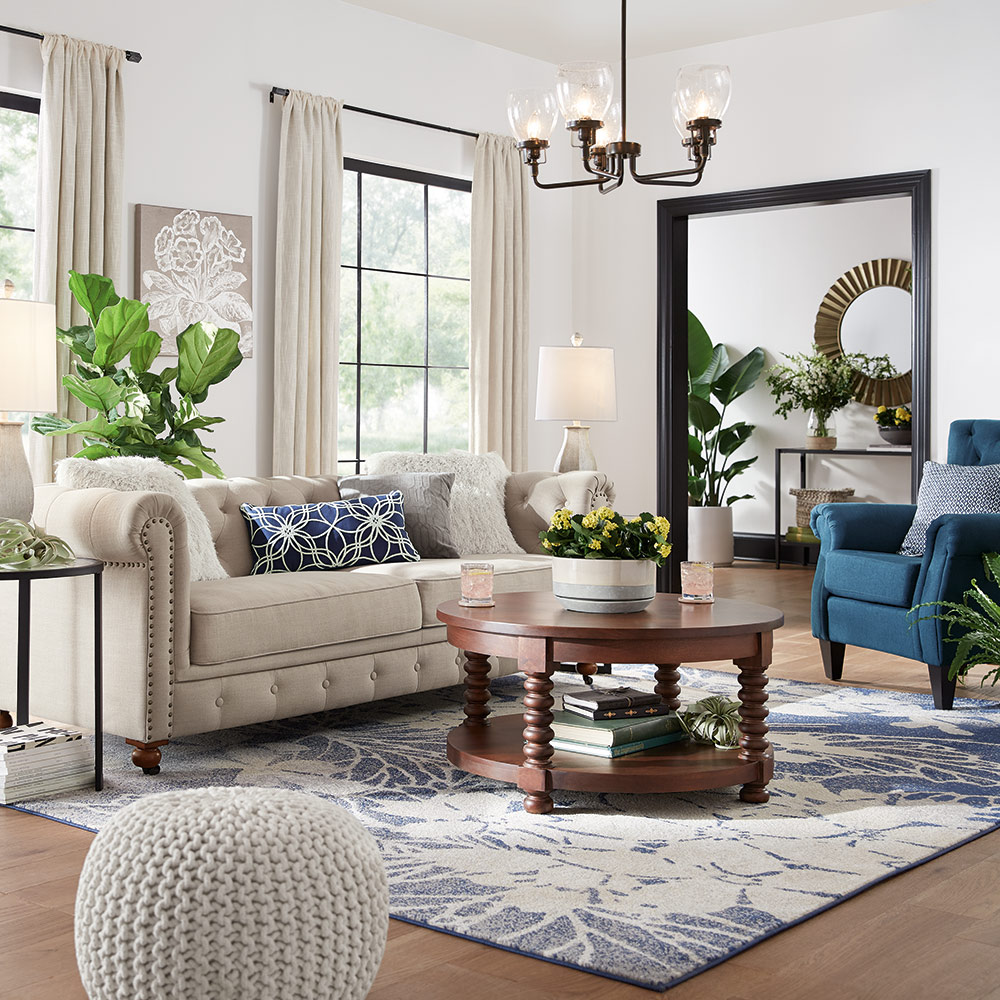 Neutral-colored backdrop makes the blues furniture stand out.