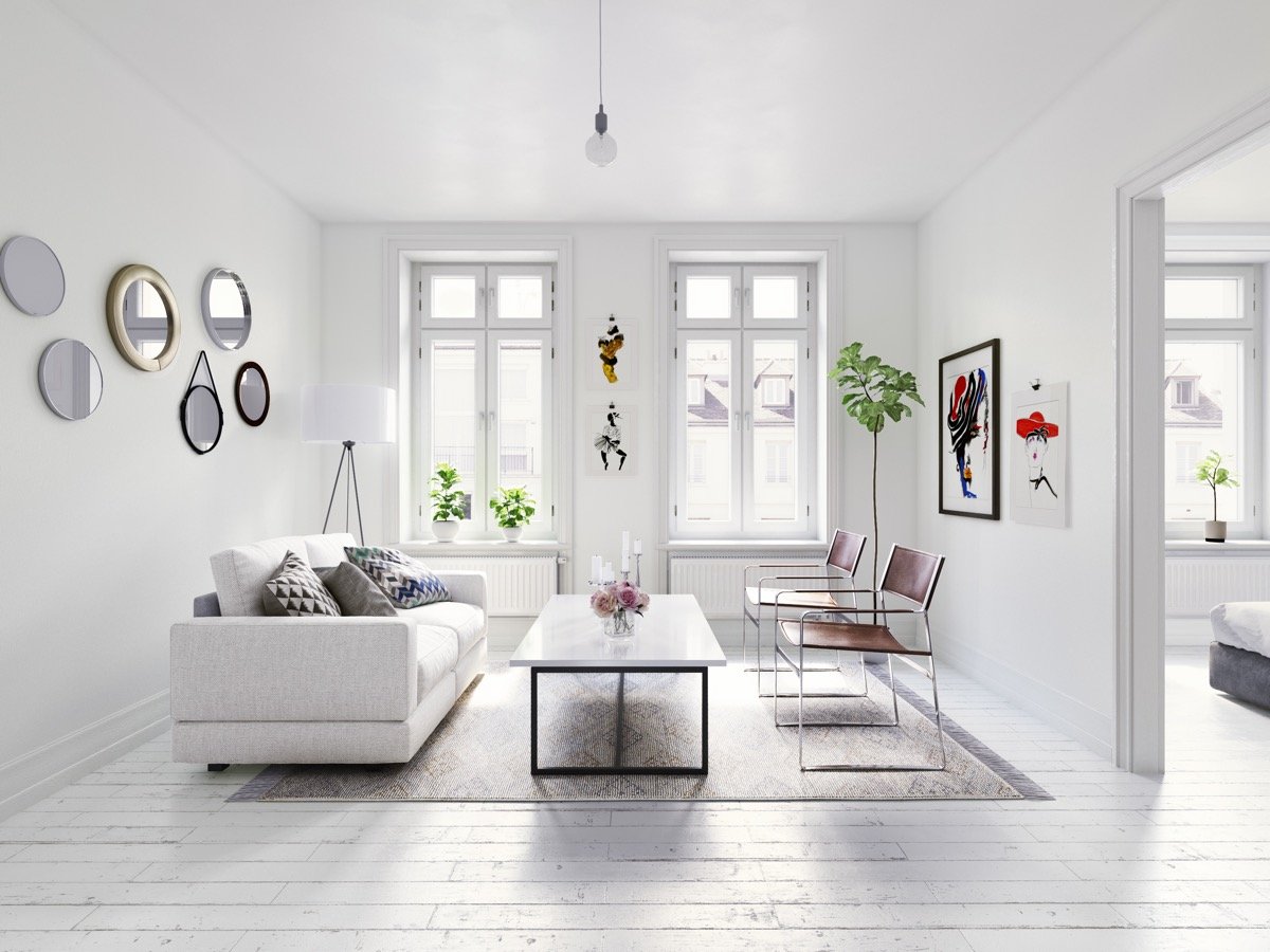 A monotone room color scheme in white can make a small room appear larger.