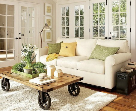 Living room done up in one color for a most expansive feel, white.