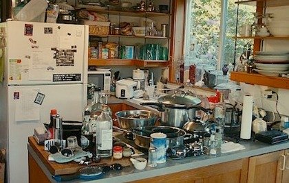 Extremely cluttered kitchen.
