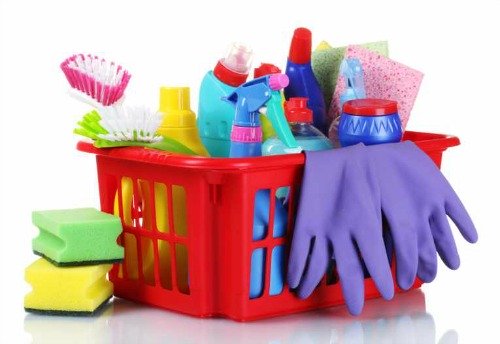 A basket of cleaning supplies.