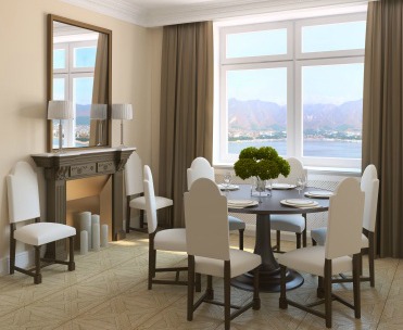 Too many chairs in this dining room makes it feel crowded. Removing two chairs will make the entire room feel larger.