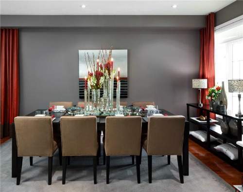 Contemporary style dining room in gray with red accents.