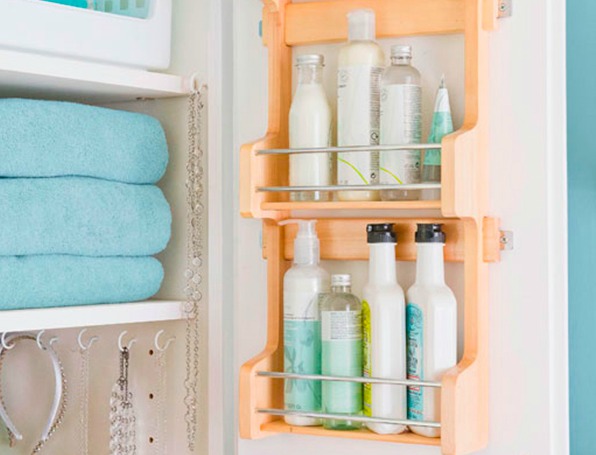 Spice racks can be used inside vanity cupboard doors for extra bathroom storage.